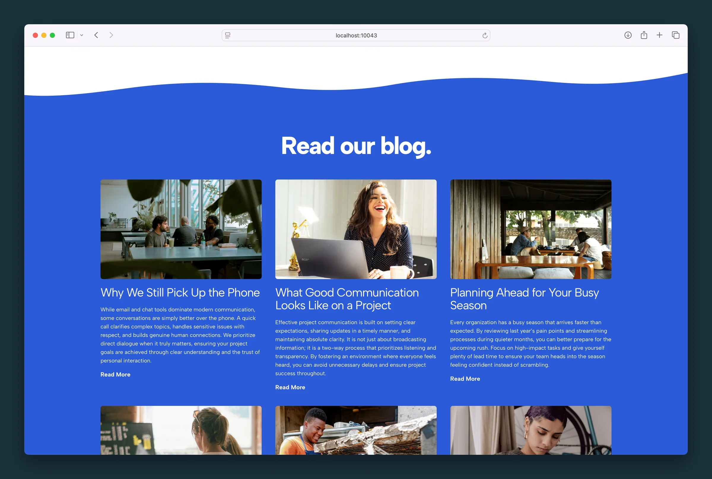 Three-column Cards layout on a blue section — images, titles, excerpts, and Read More links.